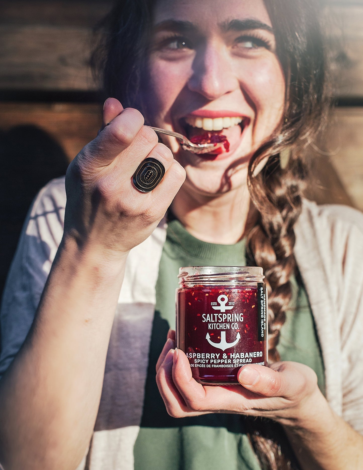 Salt Spring Kitchen Company Raspberry Habanero Spicy Pepper Spread being eaten out of the jar