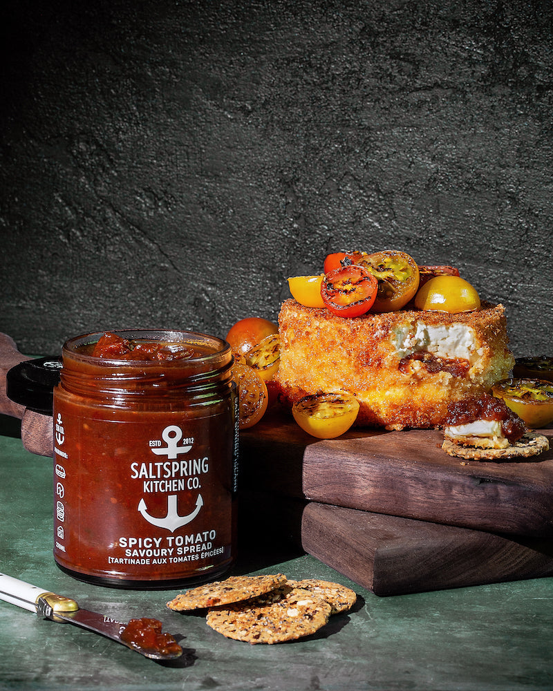 SaltSpring Kitchen Company Spicy Tomato Savoury Spread with Fried Feta on a serving board