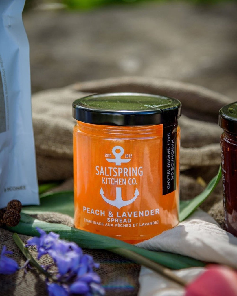 SaltSpring Kitchen Company Peach and Lavender Fruit Spread outside with flowers