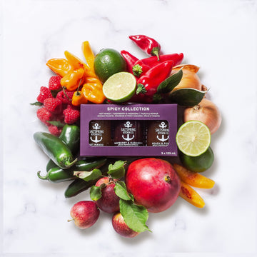 Salt Spring Kitchen Company Spicy Collection Trio Box in flat lay with ingredients