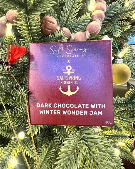 SaltSpring Kitchen Company Dark Chocolate Bar with Winter Wonder Jam in front of a Christmas tree