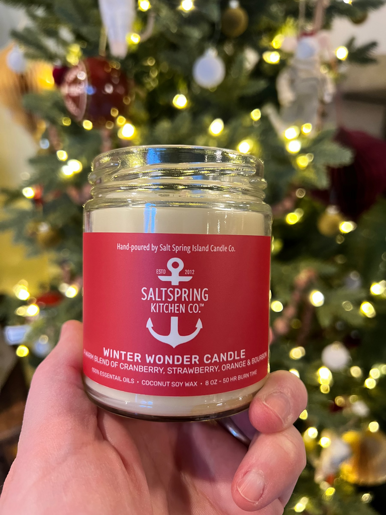 SaltSpring_Kitchen_Company_Winter_Wonder_Candle_in front of the tree