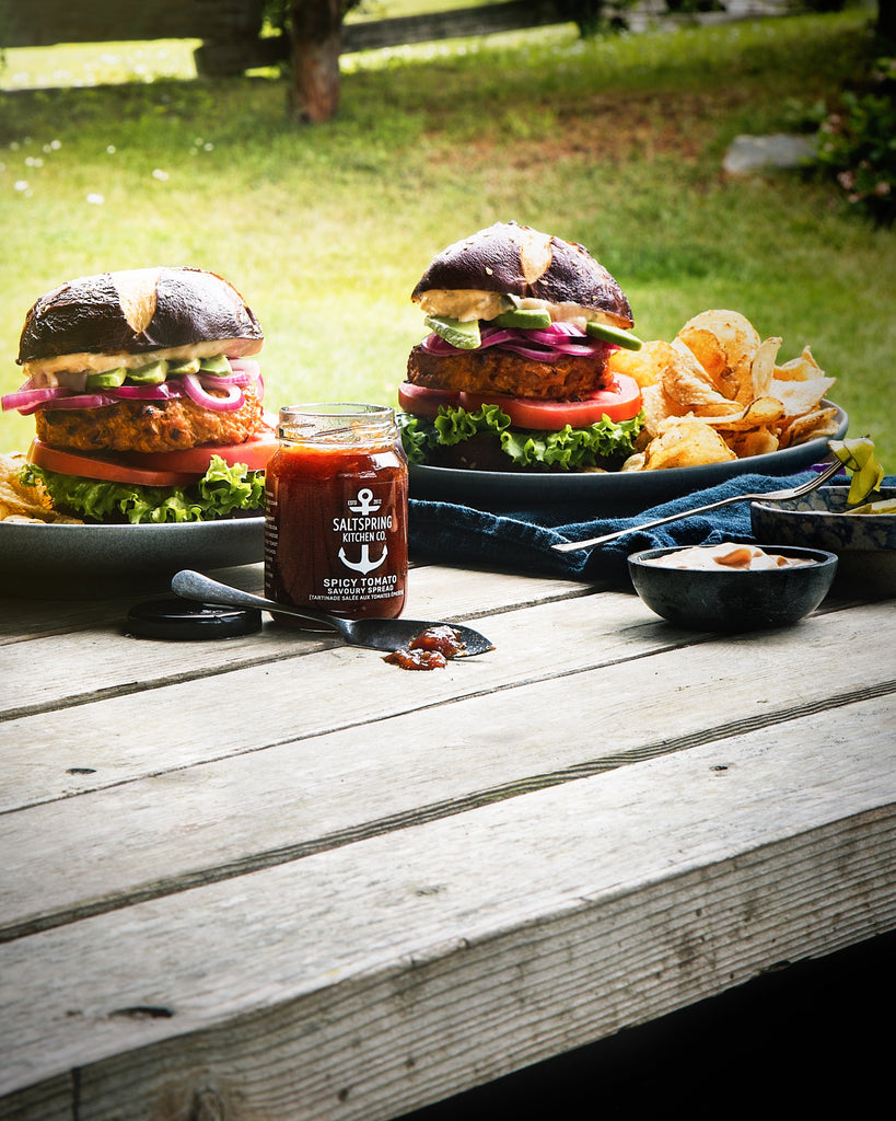 Salt Spring Kitchen Company Spicy Tomato Savoury Spread Sweet Potato Burgers on a picnic table